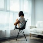 Woman sitting on chair